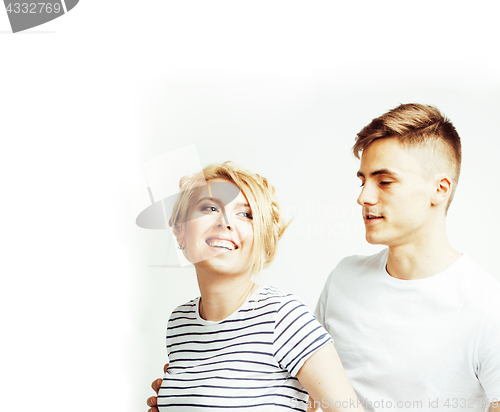 Image of young pretty teenage couple, hipster guy with his girlfriend hap