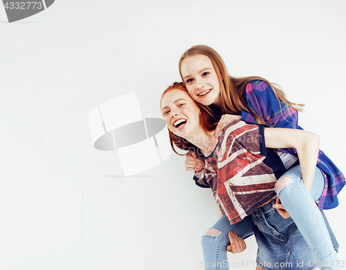 Image of best friends teenage girls together having fun, posing emotional on white background, besties happy smiling, lifestyle people concept close up. making selfie