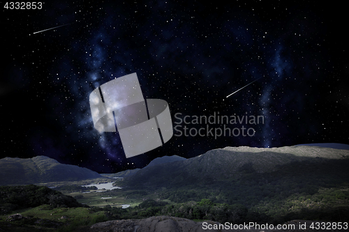 Image of mountain landscape over night sky or space