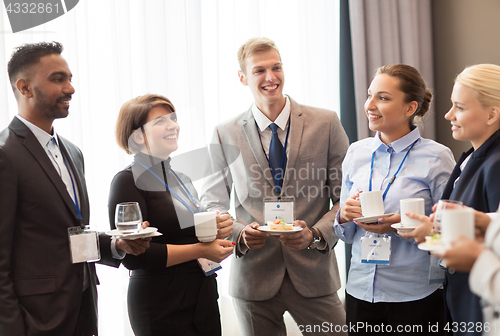 Image of happy business team at international conference