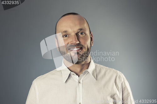 Image of bearded smiling man portrait