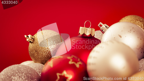 Image of christmas balls with a red background
