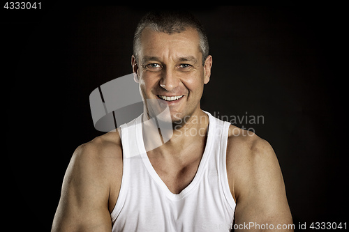 Image of dark smiling man portrait