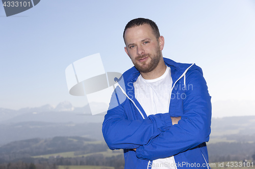 Image of bearded man standing