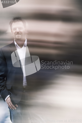 Image of man covered in an motion blur