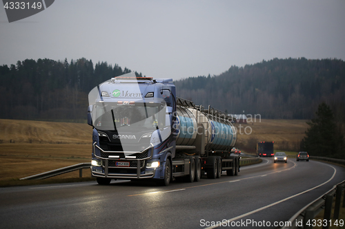 Image of Scania Tank Truck Hauls AdBlue at Dusk