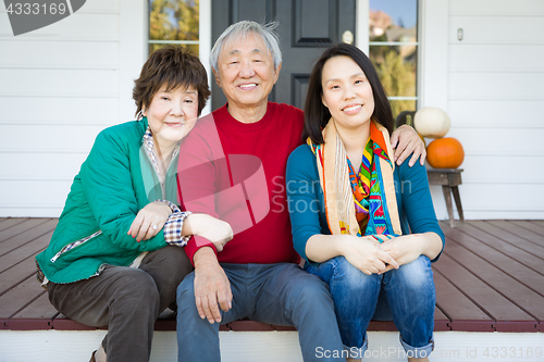 Image of Happy Chinese Senior Adult Mother and Father with Young Adult Da