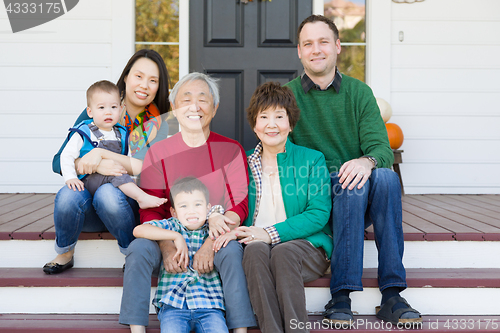 Image of Multi-generation Chinese and Caucasian Family Portrait