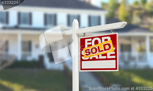 Image of Sold Home For Sale Real Estate Sign in Front of Beautiful New Ho