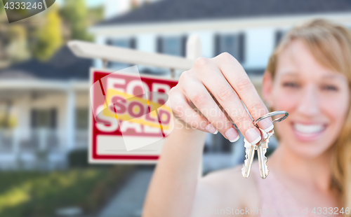 Image of Excited Woman Holding House Keys and Sold For Sale Real Estate S