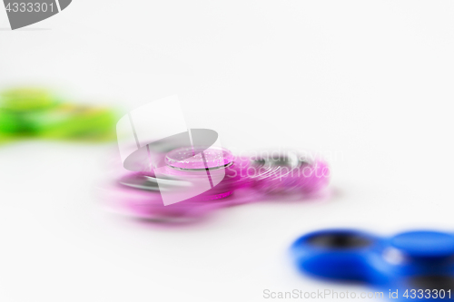 Image of close up of spinning fidget spinners