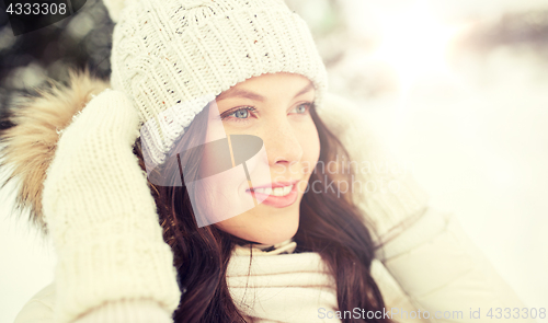 Image of happy woman outdoors in winter