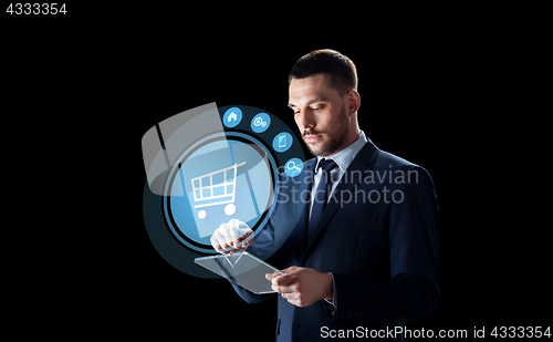 Image of businessman with tablet pc and virtual shopping