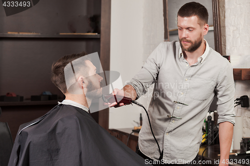 Image of Hipster client visiting barber shop