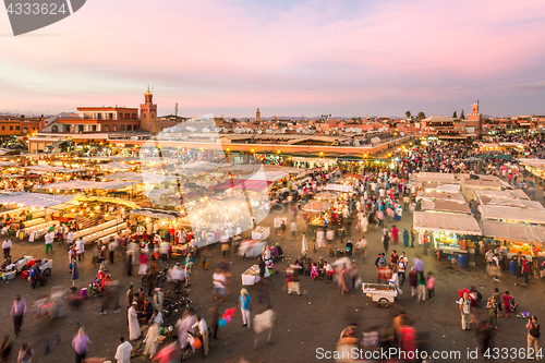 Image of Jamaa el Fna market square in sunset, Marrakesh, Morocco, north Africa.