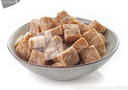 Image of Bowl of brown sugar cubes