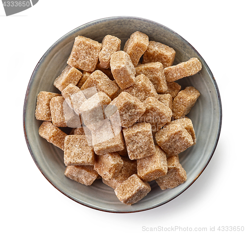 Image of Bowl of brown sugar cubes