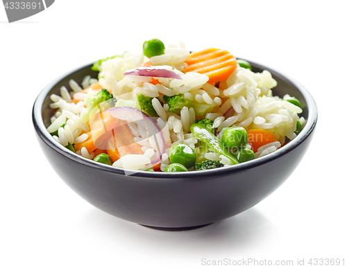 Image of Bowl of boiled rice with vegetables