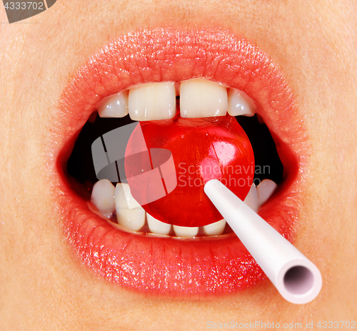 Image of lollipop in mouth