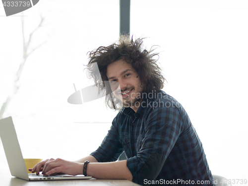 Image of man working from home