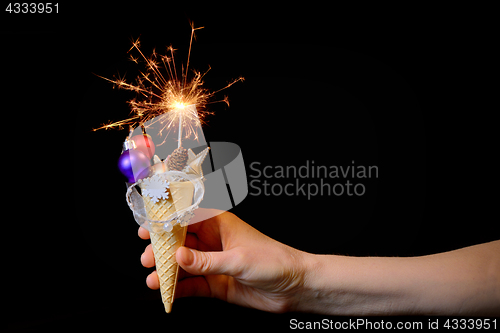 Image of Ice cream cone and christmas decoration