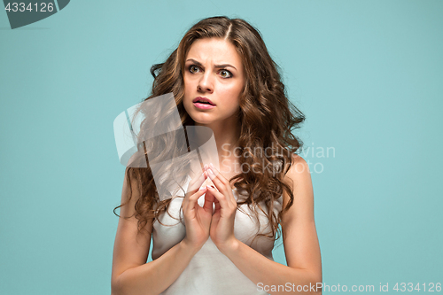 Image of The young woman\'s portrait with sad emotions