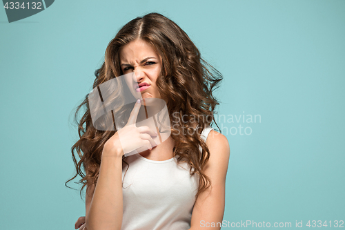 Image of The portrait of disgusted woman