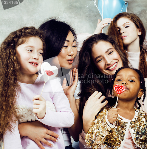 Image of Lifestyle and people concept: young pretty diversity nations woman with different age children celebrating on birth day party together happy smiling, making selfie. African-american, asian and caucasi