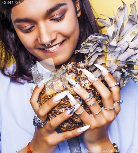 Image of lifestyle people concept. young pretty smiling indian girl with long nails wearing lot of jewelry rings, asian summer happy cool 