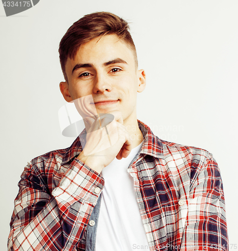 Image of young handsome teenage hipster guy posing emotional, happy smiling against white background isolated, lifestyle people concept