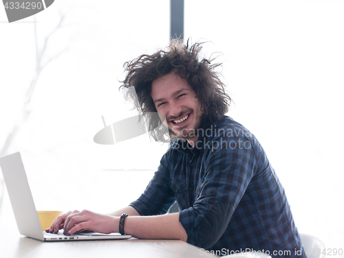 Image of man working from home
