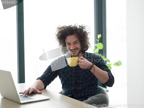 Image of man working from home