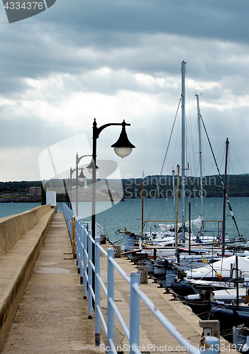 Image of Pier and Sailboats