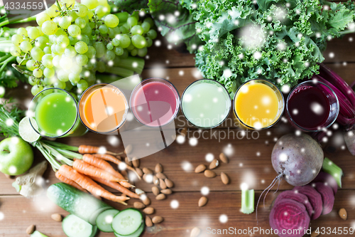 Image of glasses with different fruit or vegetable juices