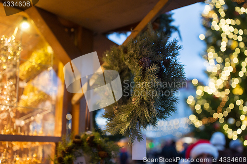 Image of close up of fir tree wreath at christmas market