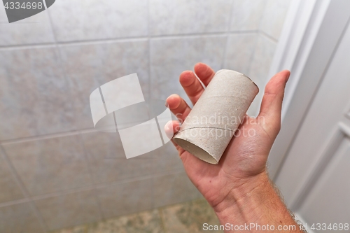 Image of Finding empty roll in the restroom