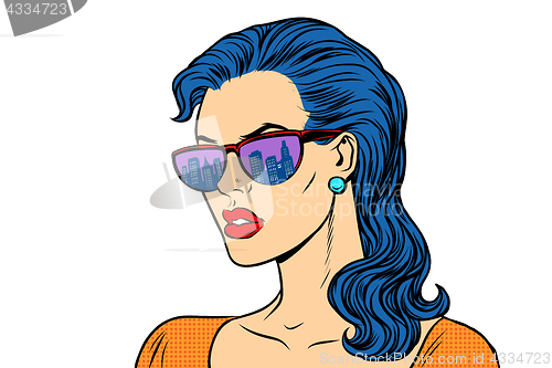 Image of Woman in sunglasses with the reflection city