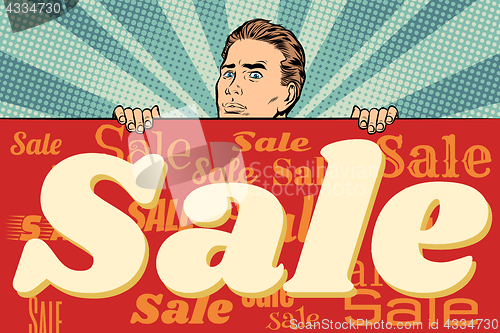 Image of man with a sales banner