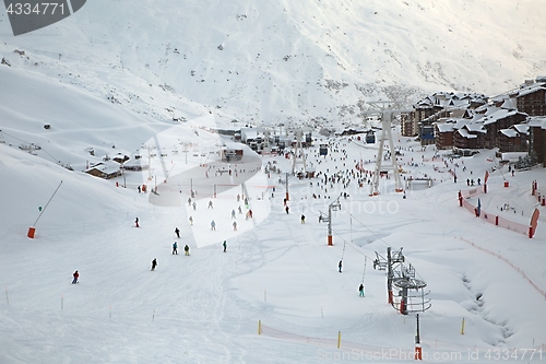 Image of Skiing slopes, with many people