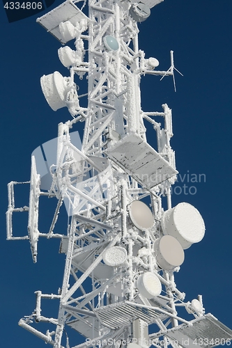 Image of Transmitter tower frozen in winter frost