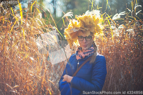 Image of Beauty woman at autumn park