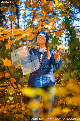 Image of Beauty woman at autumn park