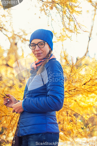 Image of Beauty woman at autumn park