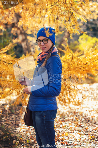 Image of Beauty woman at autumn park