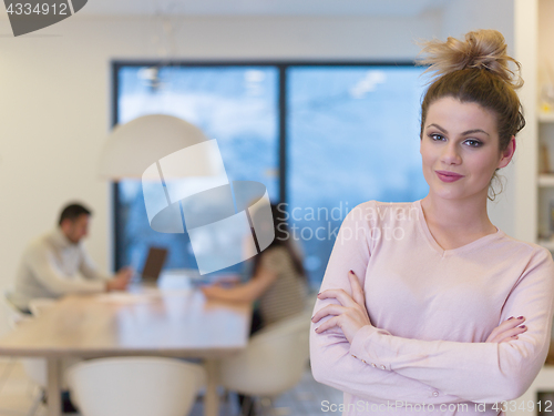 Image of Portrait of  smiling casual businesswoman using tablet  with cow