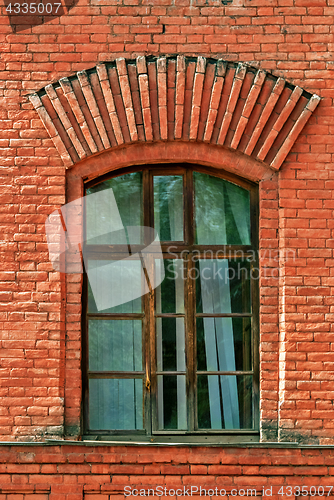 Image of Window in a brick wall.