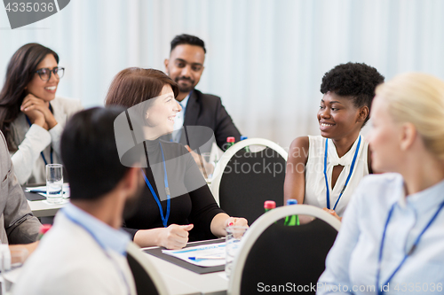 Image of happy business team at international conference