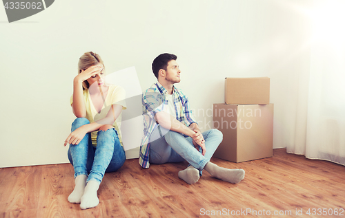 Image of unhappy couple having argument at home