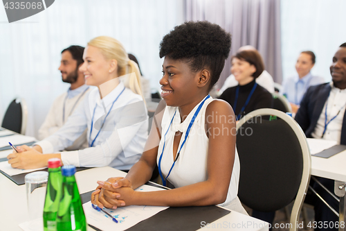 Image of happy business team at international conference