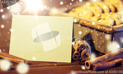 Image of close up of christmas oat cookies on wooden table